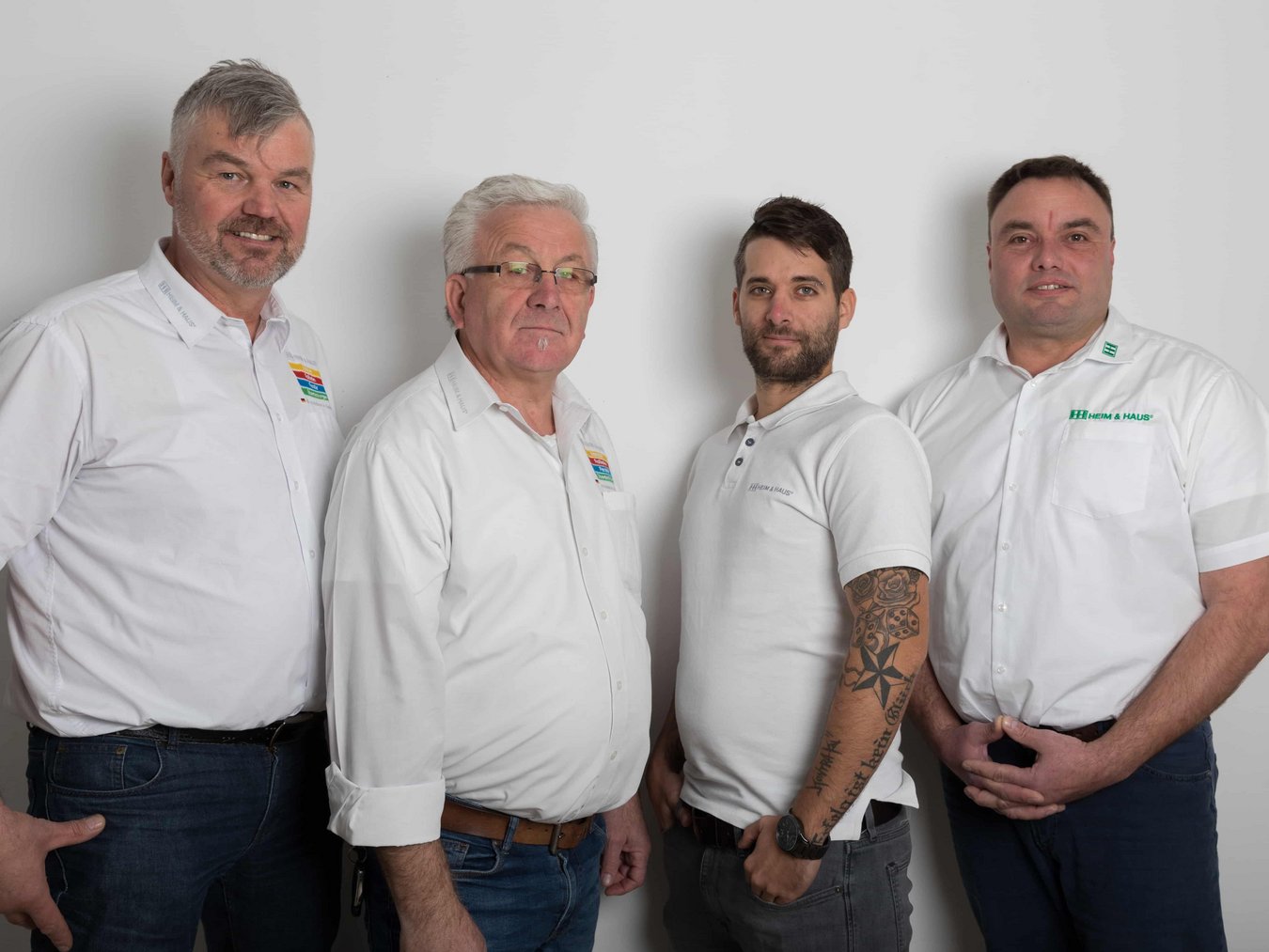 HEIM & HAUS Fachberater der Verkaufsleitung Limburg mit weißen Hemden im Teamfoto