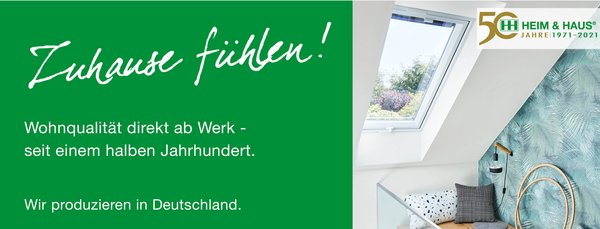 HEIM & HAUS Facebook Titelbild mit einem Dachfenster