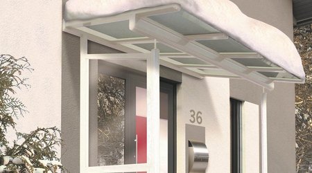 HEIM & HAUS Glasdach auf dem Schnee liegt